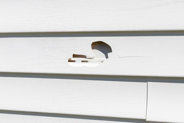 White Vinyl Siding Repair in Kenosha